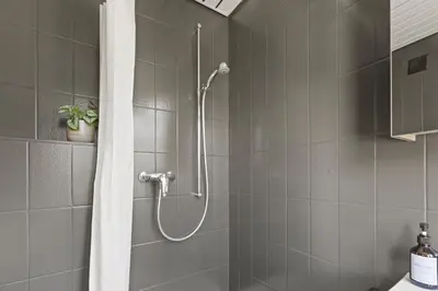 Ein Badezimmer in der Unterkunft Élégant studio, proche des bains & nature