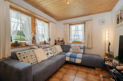 Ein Sitzbereich in der Unterkunft Charming apartment in a Chalet house
