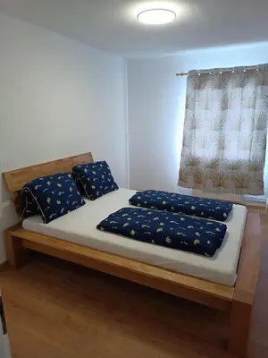 Ein Bett oder Betten in einem Zimmer der Unterkunft Swiss Alpine view apartment