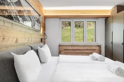 Ein Bett oder Betten in einem Zimmer der Unterkunft Altitude l Superior l View l Parking l By CosyHome