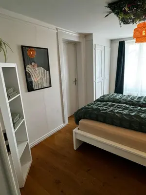 Ein Bett oder Betten in einem Zimmer der Unterkunft Cozy City Nest