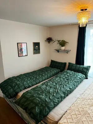 Ein Bett oder Betten in einem Zimmer der Unterkunft Cozy City Nest