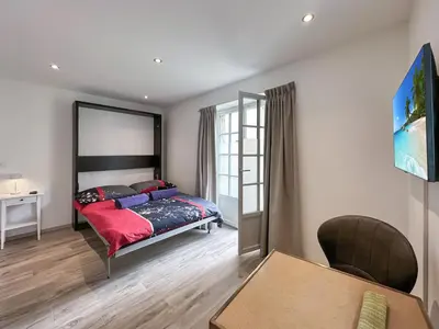 Ein Bett oder Betten in einem Zimmer der Unterkunft Sion Citadel Stay - Swiss Alps