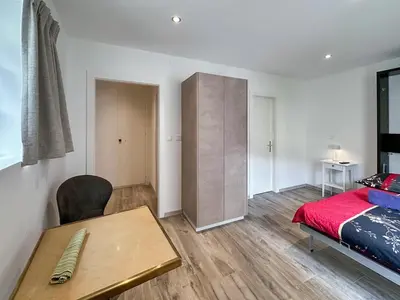 Ein Bett oder Betten in einem Zimmer der Unterkunft Sion Citadel Stay - Swiss Alps