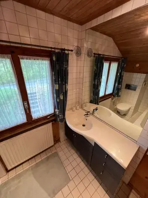 Ein Badezimmer in der Unterkunft Chalet Karin