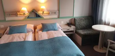 Ein Bett oder Betten in einem Zimmer der Unterkunft Bellevue-Bären