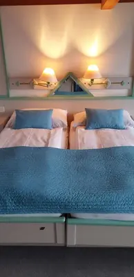 Ein Bett oder Betten in einem Zimmer der Unterkunft Bellevue-Bären