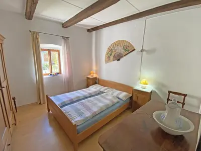 Ein Bett oder Betten in einem Zimmer der Unterkunft Al Ciod d'Or by HolAp SA