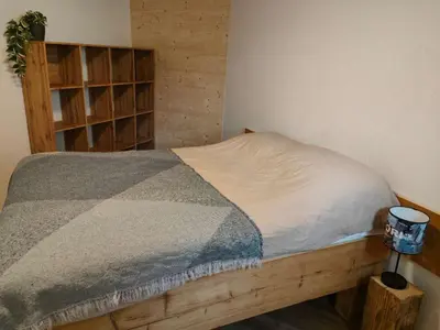 Ein Bett oder Betten in einem Zimmer der Unterkunft Frutigen Charm - two bedrooms
