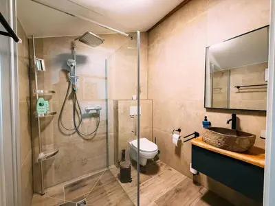 Ein Badezimmer in der Unterkunft Lakeside Barn Apartment near Interlaken