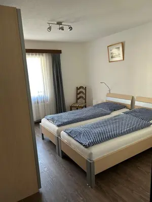 Ein Bett oder Betten in einem Zimmer der Unterkunft Haus Pasadena, Getwingstrasse