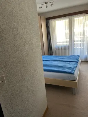 Ein Bett oder Betten in einem Zimmer der Unterkunft Haus Pasadena, Getwingstrasse