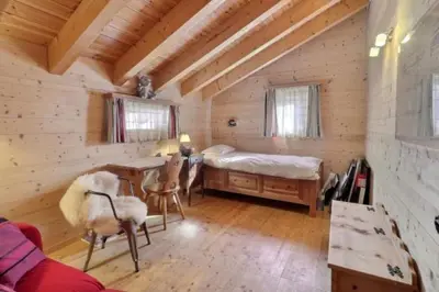 Ein Bett oder Betten in einem Zimmer der Unterkunft Grange de Fonville - Evolène - Valais