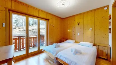 Ein Bett oder Betten in einem Zimmer der Unterkunft Hauts de Veysonnaz HV1 010 - SAUNA apartment 6 per