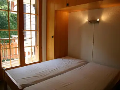 Ein Bett oder Betten in einem Zimmer der Unterkunft Alluring apartment in Les Agettes
