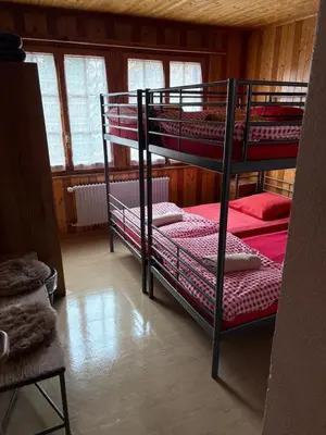 Ein Bett oder Betten in einem Zimmer der Unterkunft Séjour Edelweiss