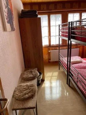 Ein Bett oder Betten in einem Zimmer der Unterkunft Séjour Edelweiss
