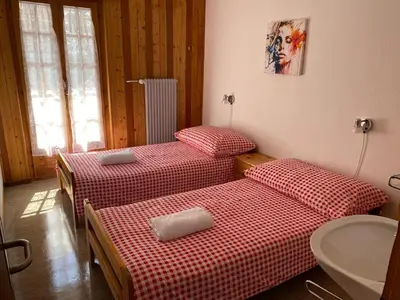 Ein Bett oder Betten in einem Zimmer der Unterkunft Séjour Edelweiss