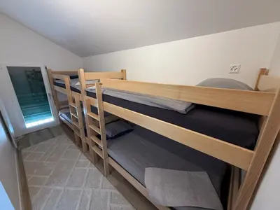 Ein Bett oder Betten in einem Zimmer der Unterkunft Charmant appartement Lens - Crans-Montana
