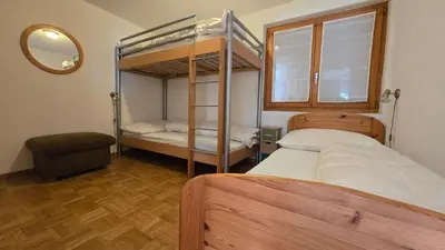 Ein Bett oder Betten in einem Zimmer der Unterkunft Belalp - schöne Ferienwohnung SOLELUNA