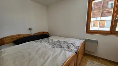 Ein Bett oder Betten in einem Zimmer der Unterkunft Belalp - schöne Ferienwohnung SOLELUNA