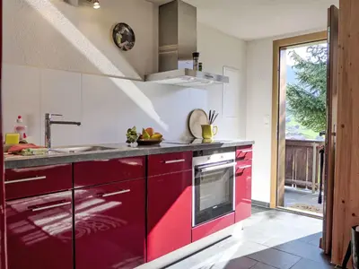 Küche/Küchenzeile in der Unterkunft Holiday Home Chalet Träumli by Interhome