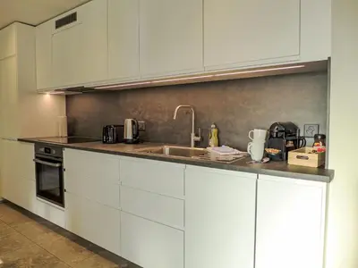 Küche/Küchenzeile in der Unterkunft Apartment Huus Chloster- Apt Niesen by Interhome
