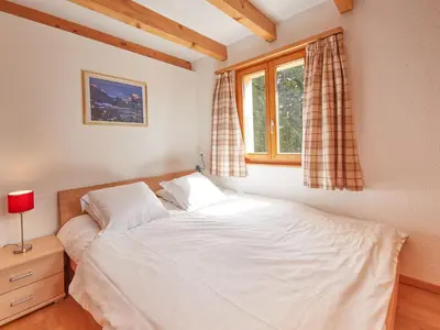 Ein Bett oder Betten in einem Zimmer der Unterkunft Apartment Pinsons by Interhome
