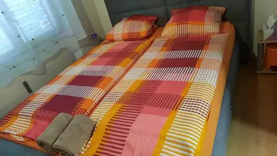Ein Bett oder Betten in einem Zimmer der Unterkunft Grosszügige, charmante Wohnung in den Bergen
