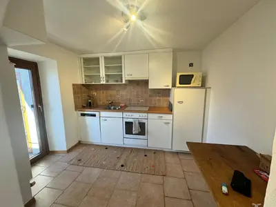 Küche/Küchenzeile in der Unterkunft appartement Valentine au coeur des 4 Vallées