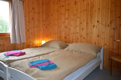 Ein Bett oder Betten in einem Zimmer der Unterkunft Immeuble Les Sérandes