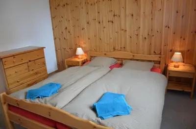 Ein Bett oder Betten in einem Zimmer der Unterkunft Immeuble Les Sérandes
