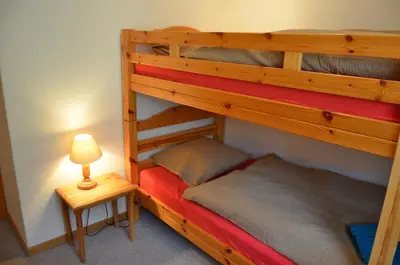 Ein Bett oder Betten in einem Zimmer der Unterkunft Immeuble Les Sérandes