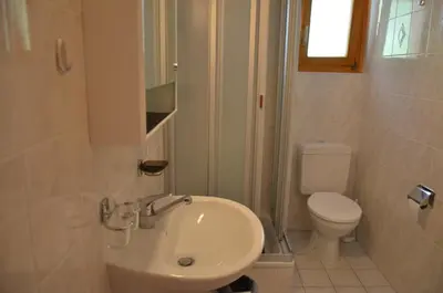 Ein Badezimmer in der Unterkunft Immeuble Les Sérandes