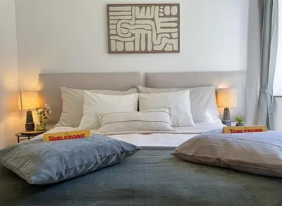 Ein Bett oder Betten in einem Zimmer der Unterkunft Casita3922, Tor zu Zermatt, Saas-Fee und Visp, Work and Chill Apartement - Nähe Lonza, Free Parking