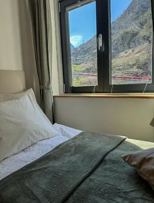 Ein Bett oder Betten in einem Zimmer der Unterkunft Casita3922, Tor zu Zermatt, Saas-Fee und Visp, Work and Chill Apartement - Nähe Lonza, Free Parking