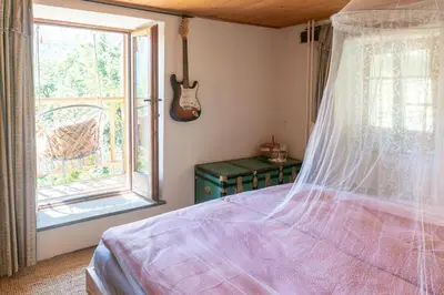Ein Bett oder Betten in einem Zimmer der Unterkunft Wild Valley Essenza in the Onsernone Valley