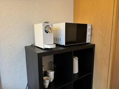 Kaffee-/Teezubehör in der Unterkunft Zentrumsnahe Wohnung mit Blick
