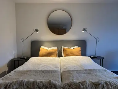 Ein Bett oder Betten in einem Zimmer der Unterkunft Zentrumsnahe Wohnung mit Blick