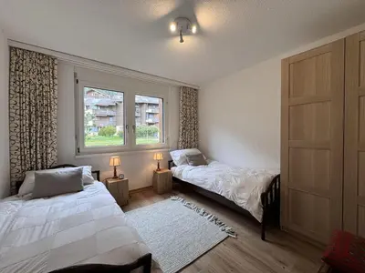 Ein Bett oder Betten in einem Zimmer der Unterkunft Chalet Primula 3