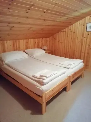 Ein Bett oder Betten in einem Zimmer der Unterkunft Magnificent chalet Opa