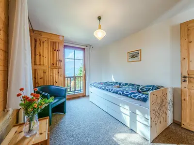 Ein Sitzbereich in der Unterkunft Chalet Marinette
