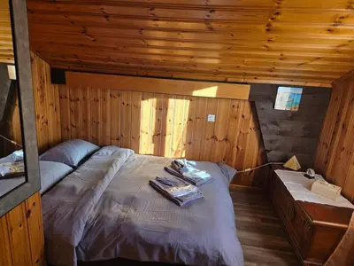 Ein Bett oder Betten in einem Zimmer der Unterkunft Duplex Salgesch