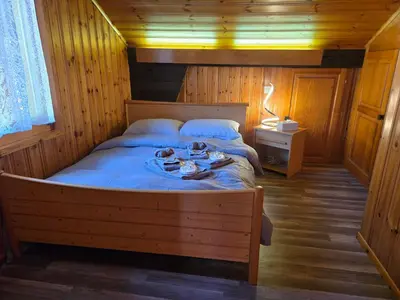 Ein Bett oder Betten in einem Zimmer der Unterkunft Duplex Salgesch