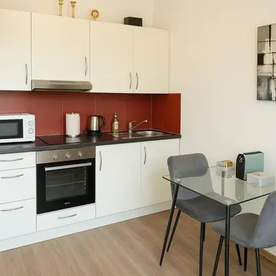Küche/Küchenzeile in der Unterkunft SpiezStationLoft
