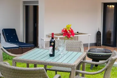 Ein Sitzbereich in der Unterkunft Oasi relax