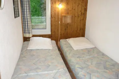 Ein Bett oder Betten in einem Zimmer der Unterkunft Magrappe M 229 - SKI LIFT apartment 10 pers