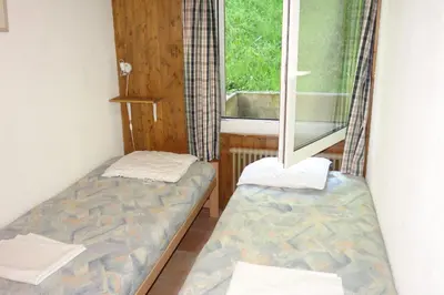 Ein Bett oder Betten in einem Zimmer der Unterkunft Magrappe M 229 - SKI LIFT apartment 10 pers