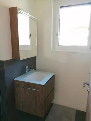 Ein Badezimmer in der Unterkunft Top neu und modern