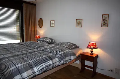 Ein Bett oder Betten in einem Zimmer der Unterkunft Mandarin A11
